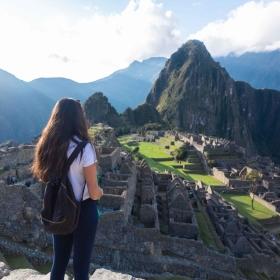 Volunteers in South America taking a photo of Machu Picchu while on a weekend break from their project in Peru.